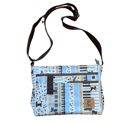 Image of Music Bumblebees Music Bag Light Blue Music Themed Water-resistant Music Themed Water-resistant Multi-Pocket Shoulder Bag - Kittens & Keys Series