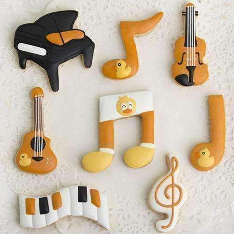 Image of Music Bumblebees Music Kitchen Music Themed Metal Cookie Cutters - Set of 4, Beamed Quaver, G Clef, Quaver and Guitar