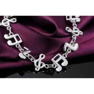 Ladies Bangle Bracelet with Music Notes Silver